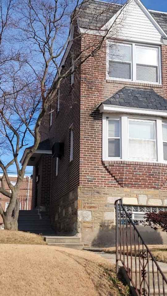 7703 Woolston Ave - Photo 2 of 13