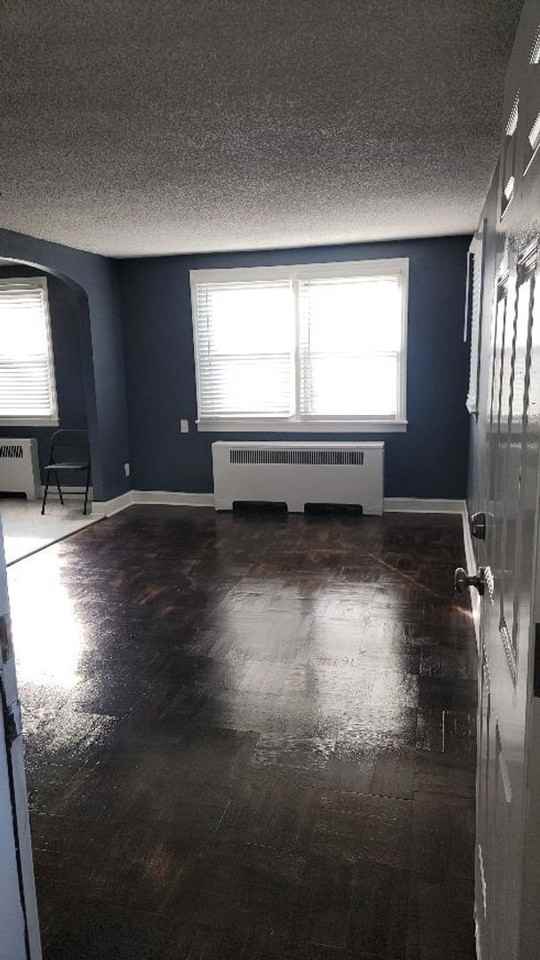 7703 Woolston Ave - Photo 4 of 13