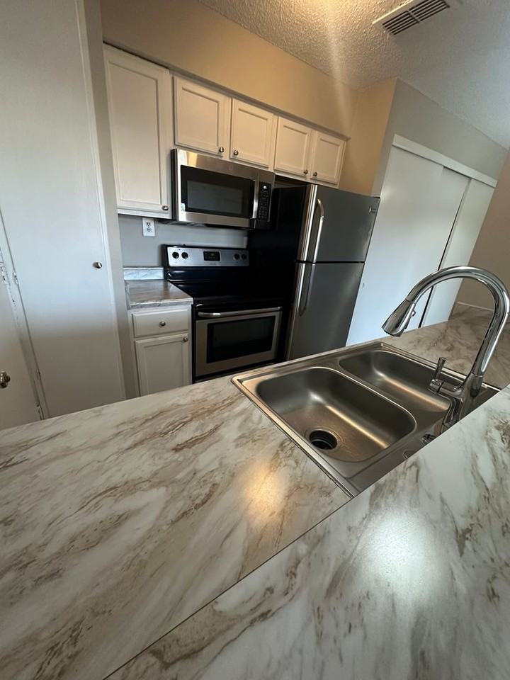 6699 Whispering Oak Pl #4 - Photo 3 of 11