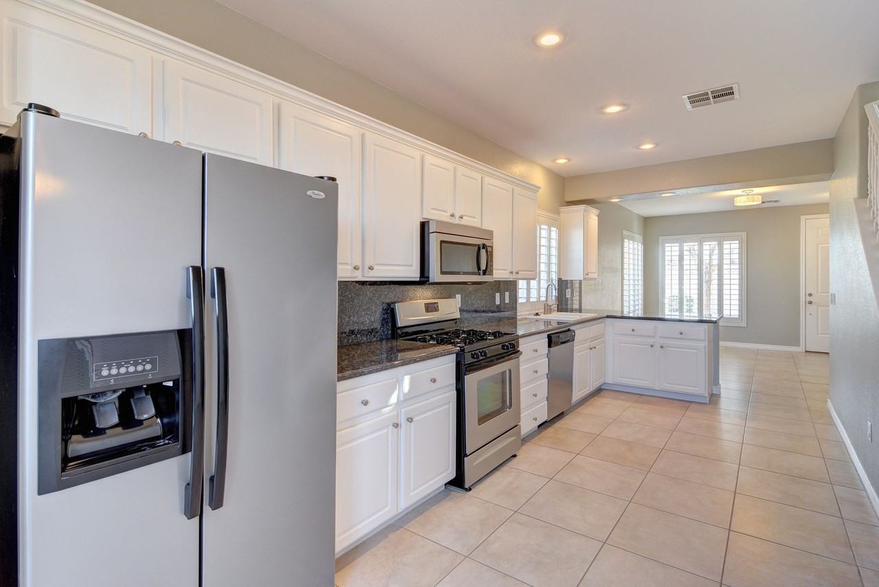 6158 Adams Bay Ave - Photo 5 of 16