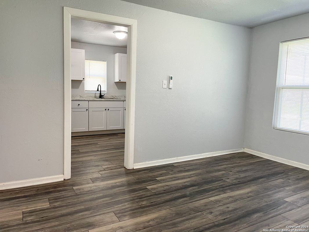 510 Avenue C - Photo 6 of 8