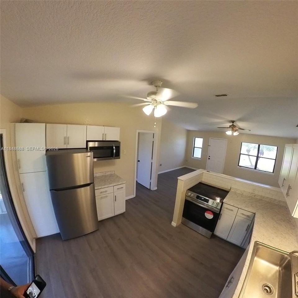 21548 Seyburn Ter - Photo 5 of 25