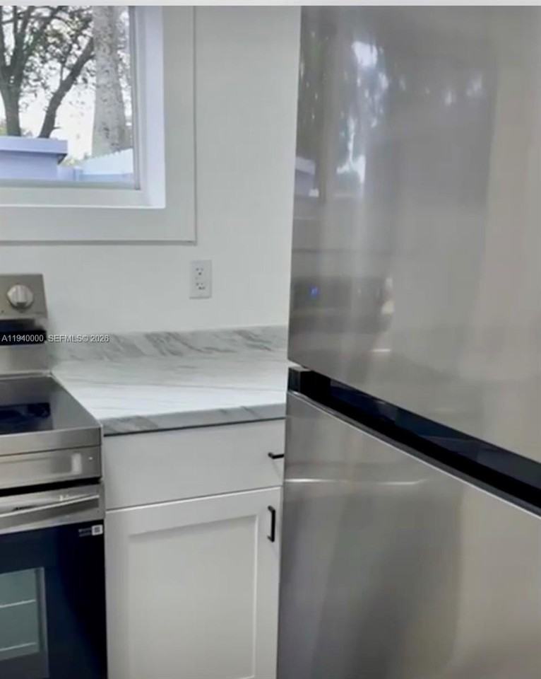 651 N 73rd Ave - Photo 6 of 8