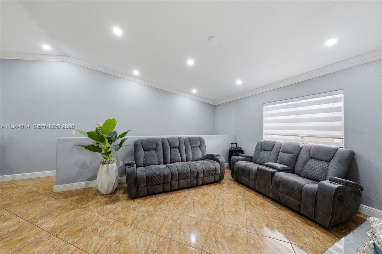 11025 W Okeechobee Rd #201 - Photo 2 of 24