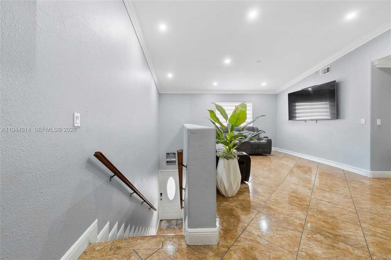 11025 W Okeechobee Rd #201 - Photo 3 of 24