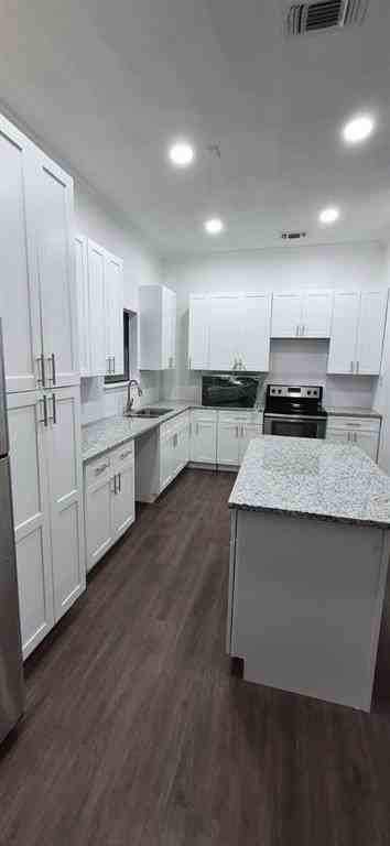 7000 Bentley Ave - Photo 6 of 28