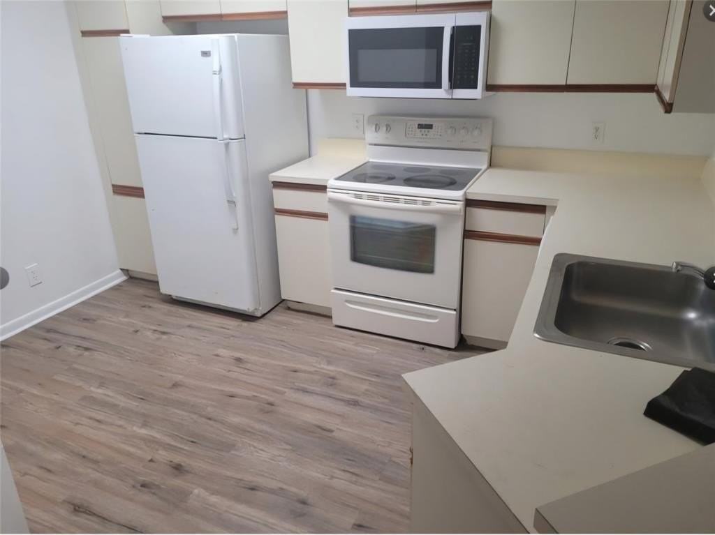 8741 Wiles Rd #305 - Photo 3 of 20