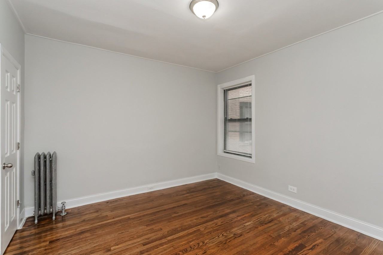 6913 S Paxton Ave Apt 1 #1 - Photo 7 of 11