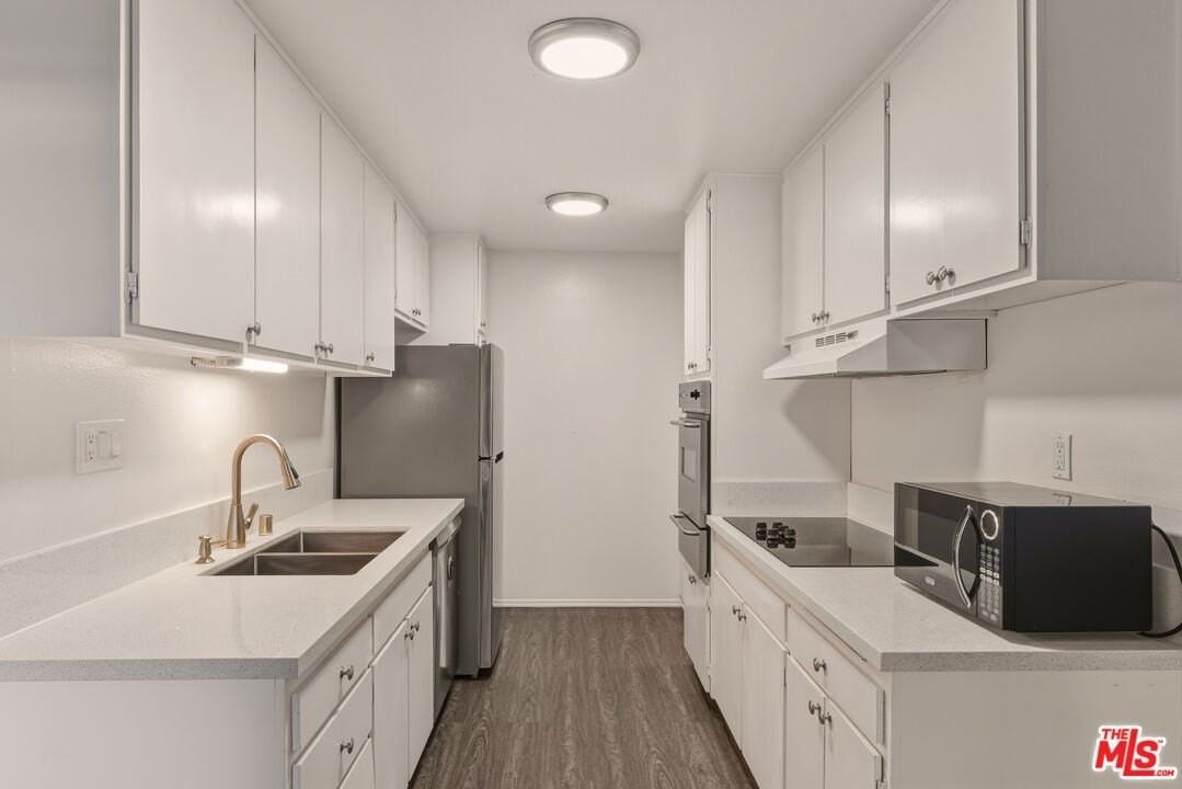 6050 Canterbury Dr Unit F121 #F121 - Photo 4 of 16