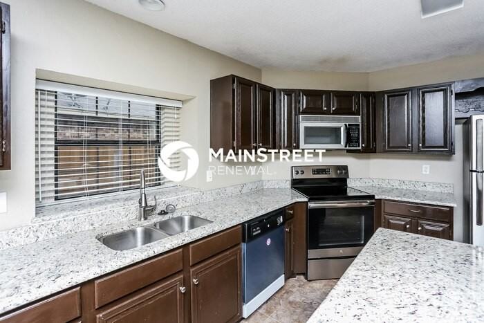 4902 Waxwing Dr - Photo 5 of 16