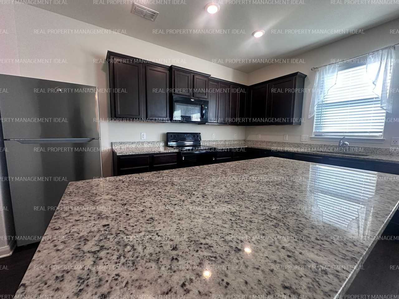 14310 Wrangler Way - Photo 6 of 25