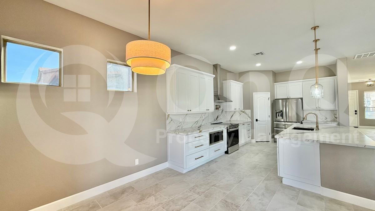 10722 E Lobo Ave - Photo 5 of 23