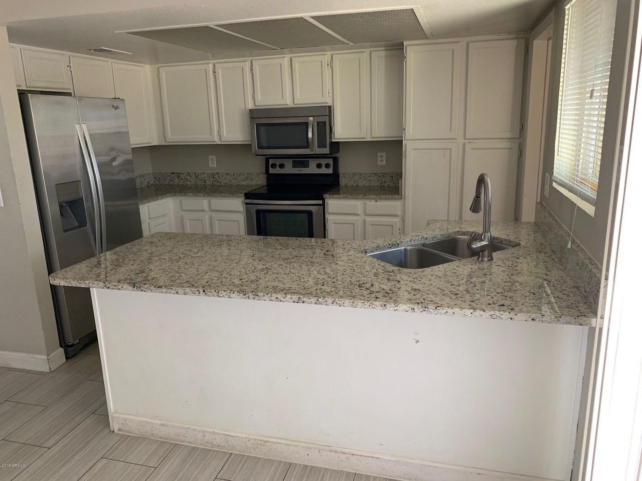 5811 N 59th Dr - Photo 3 of 11