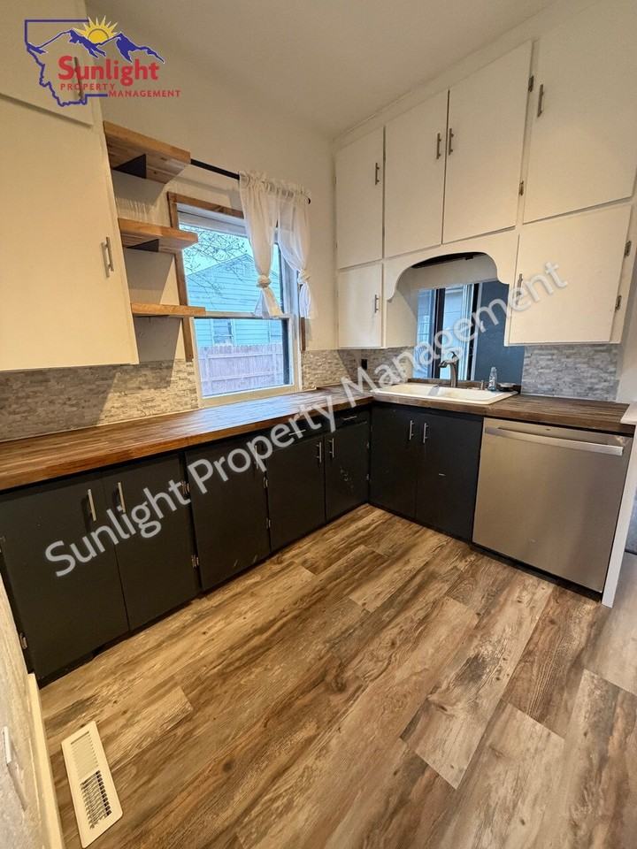 411 E 5th St - Photo 5 of 15