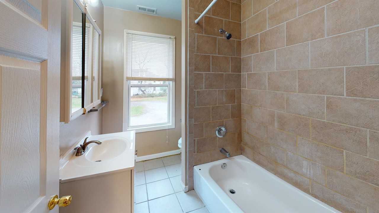 2001 Genesee St - Photo 7 of 12