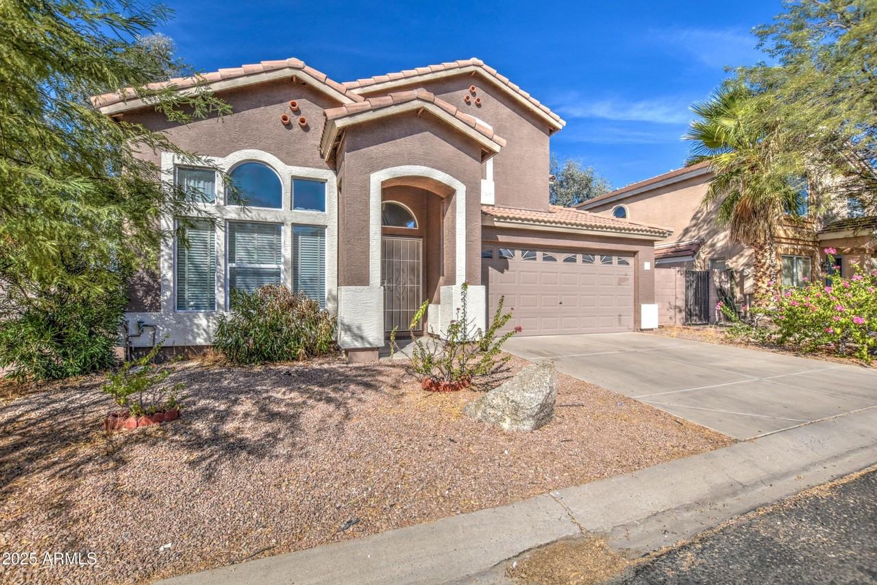 6660 E Riverdale St - Photo 3 of 50