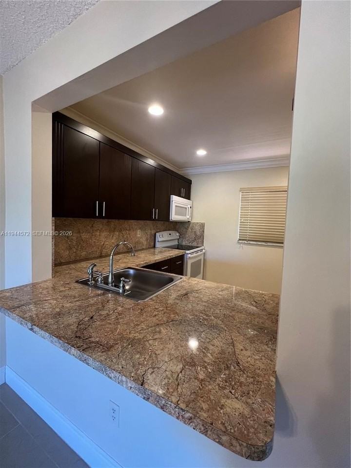 7730 Camino Real #F307 - Photo 3 of 25