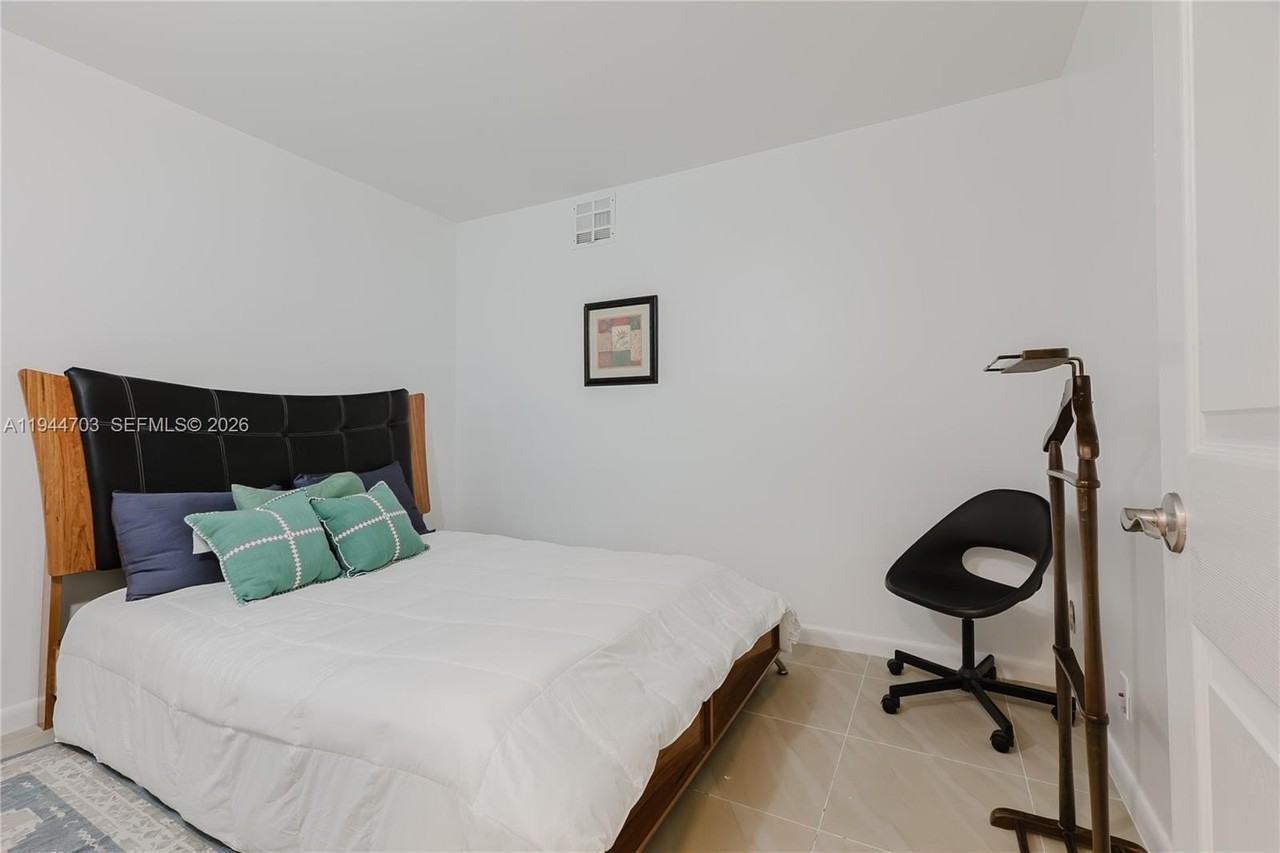 8300 Sands Point Blvd #K106 - Photo 6 of 35