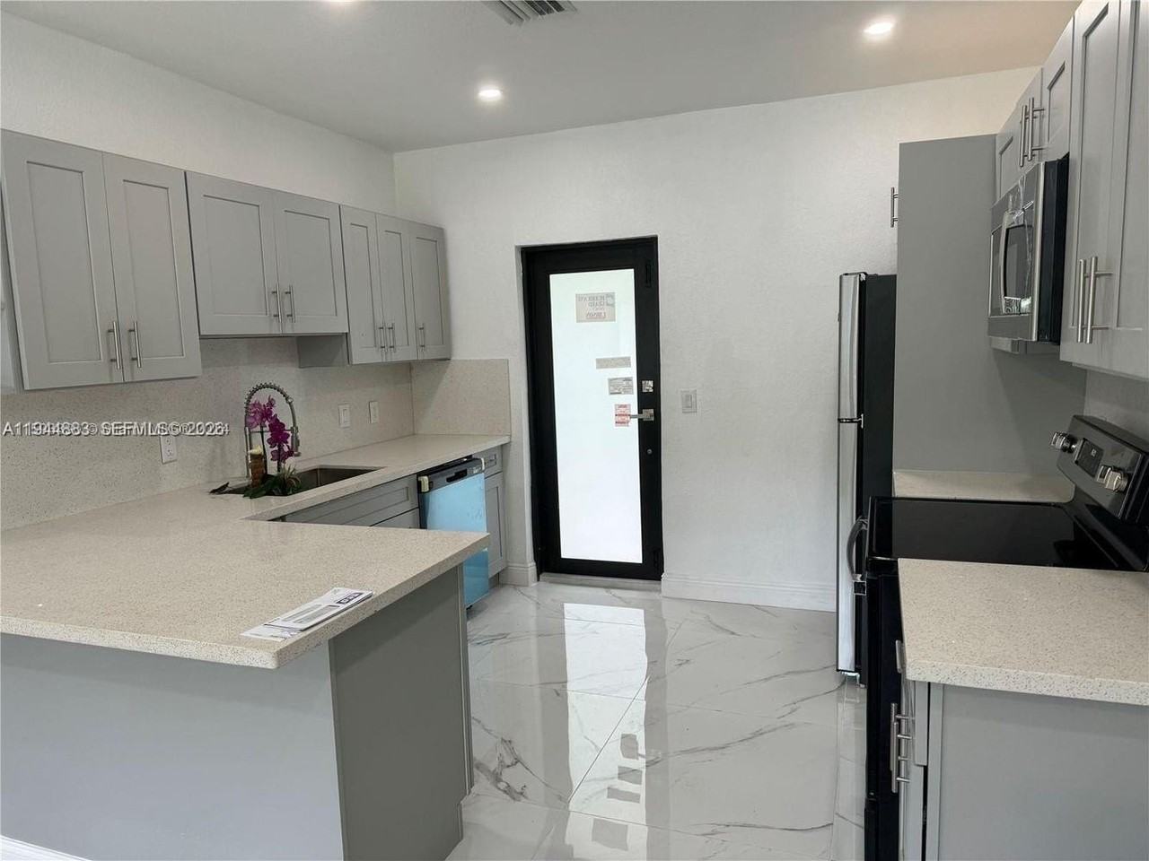 1210 Nw 123rd St #1210 - Photo 5 of 12