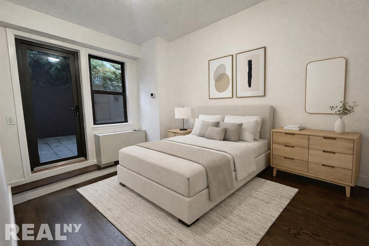 E 63rd St - Photo 3 of 11