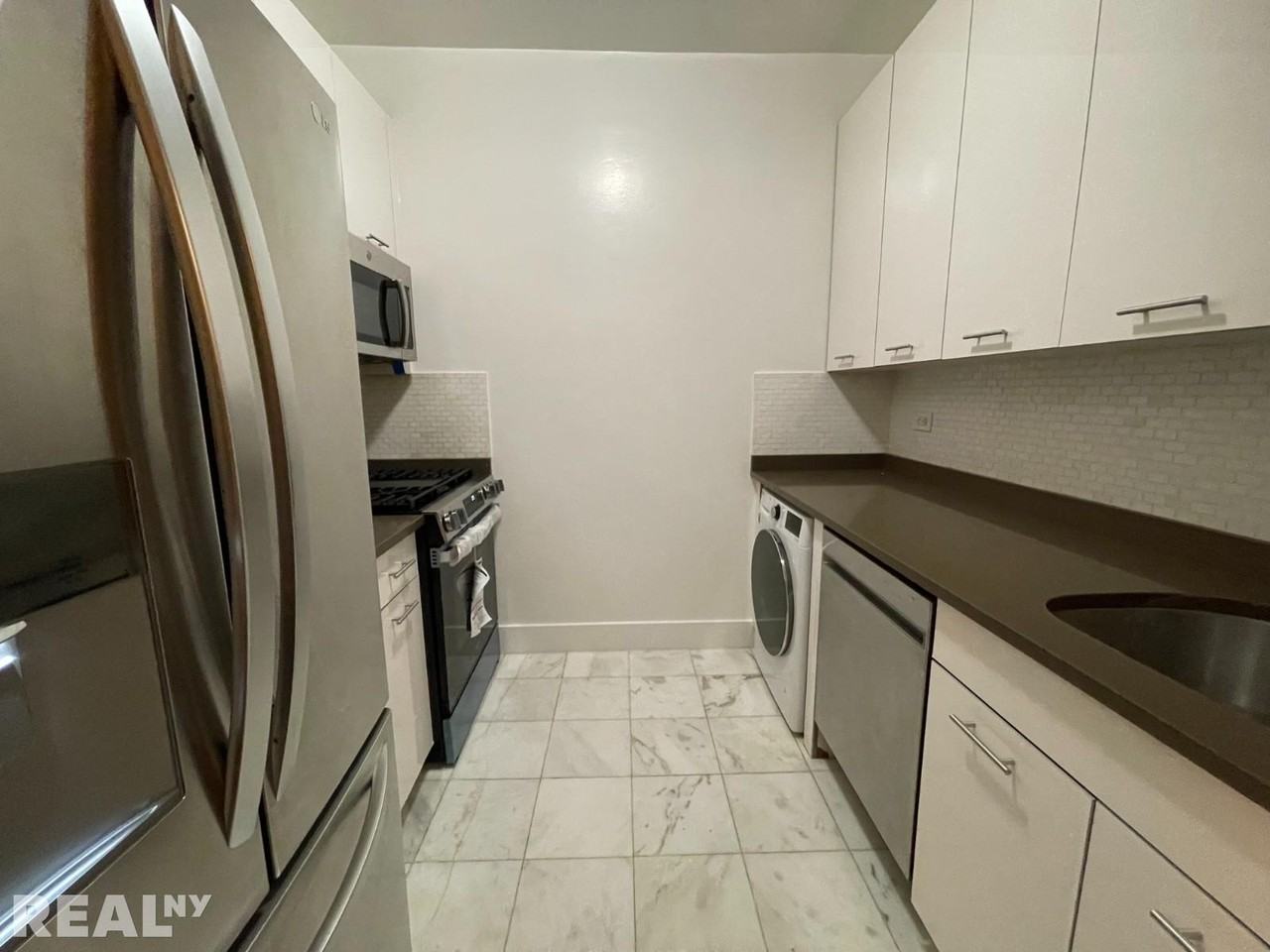 E 63rd St - Photo 5 of 11