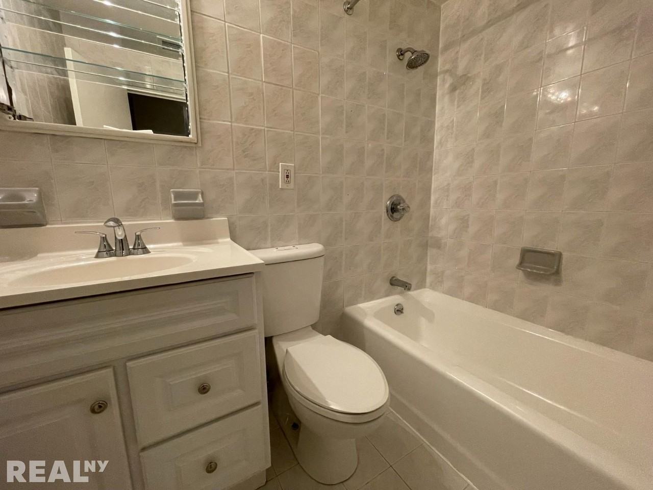 E 63rd St - Photo 6 of 11