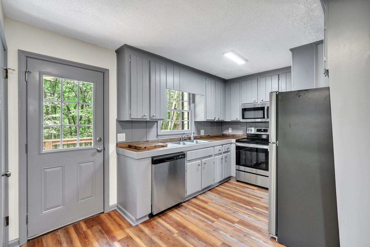 5902 Cumming Hwy #1 - Photo 3 of 35