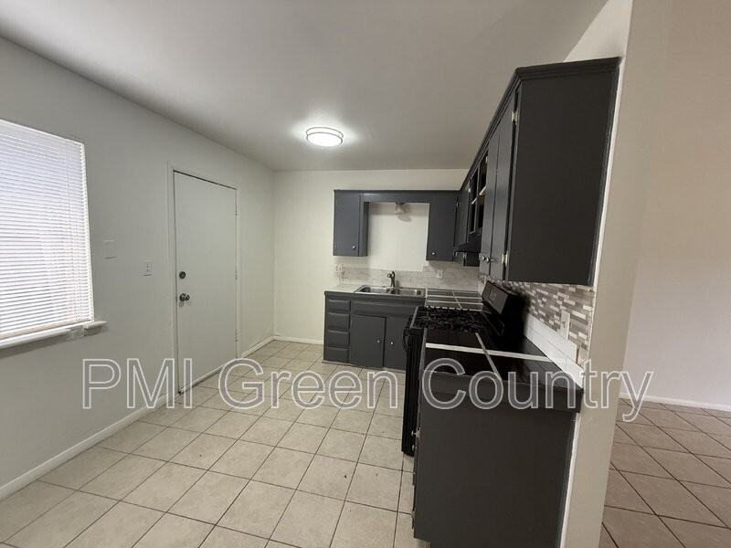 1418 S 73rd East Ave - Photo 3 of 9