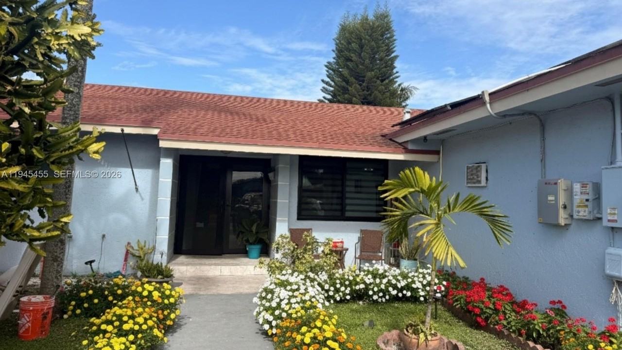 10417 Nw 129th St #MAIN - Photo 2 of 16