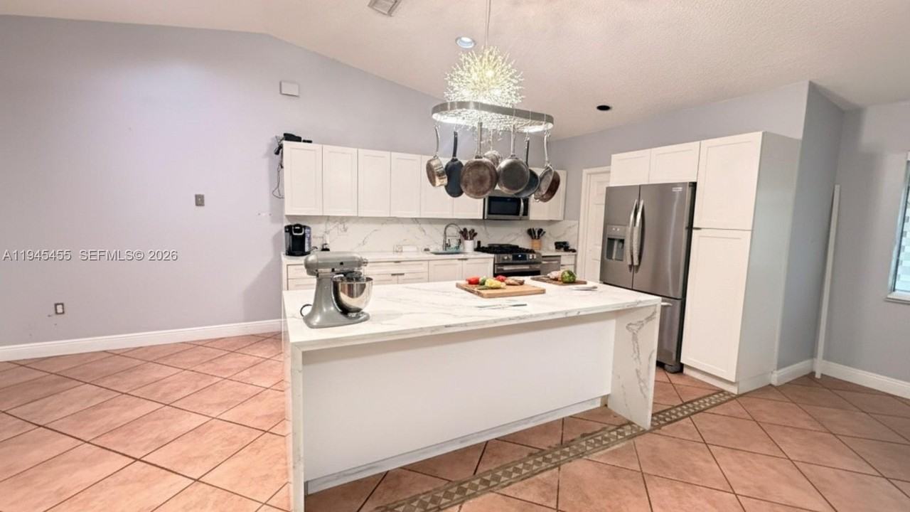 10417 Nw 129th St #MAIN - Photo 5 of 16