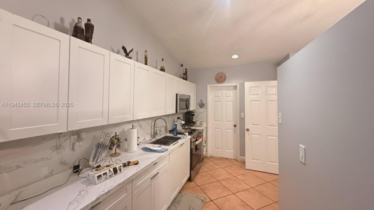 10417 Nw 129th St #MAIN - Photo 6 of 16