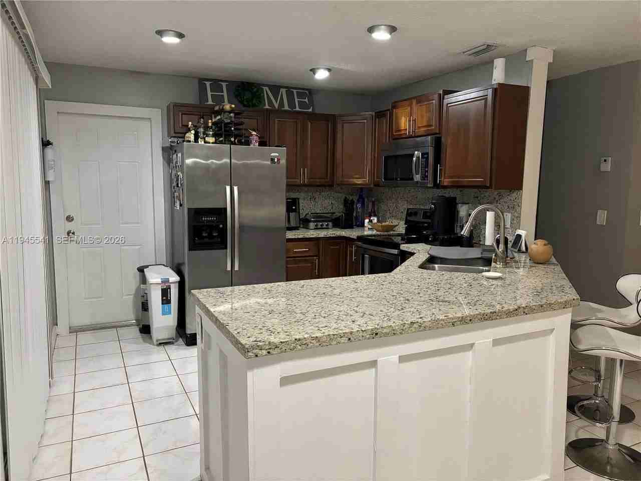 9716 Nw 51st Ter - Photo 2 of 18