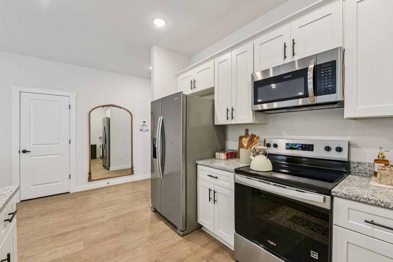 Brand-New Luxury Townhomes | Move-In Ready! Fenced In yard + Pet Friendly ! - Photo 2 of 38