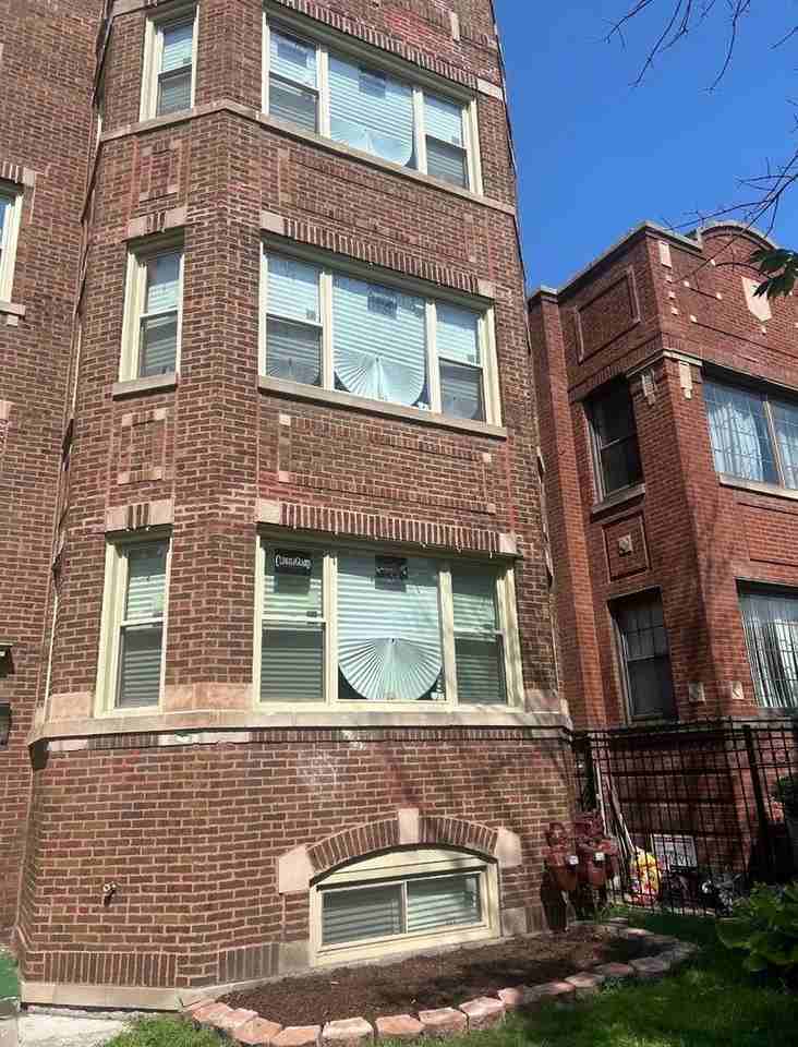 7730 S Cornell Ave - Photo 2 of 50