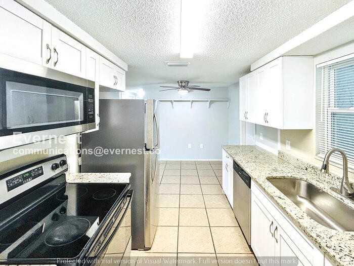 11710 Paige Dr - Photo 4 of 31