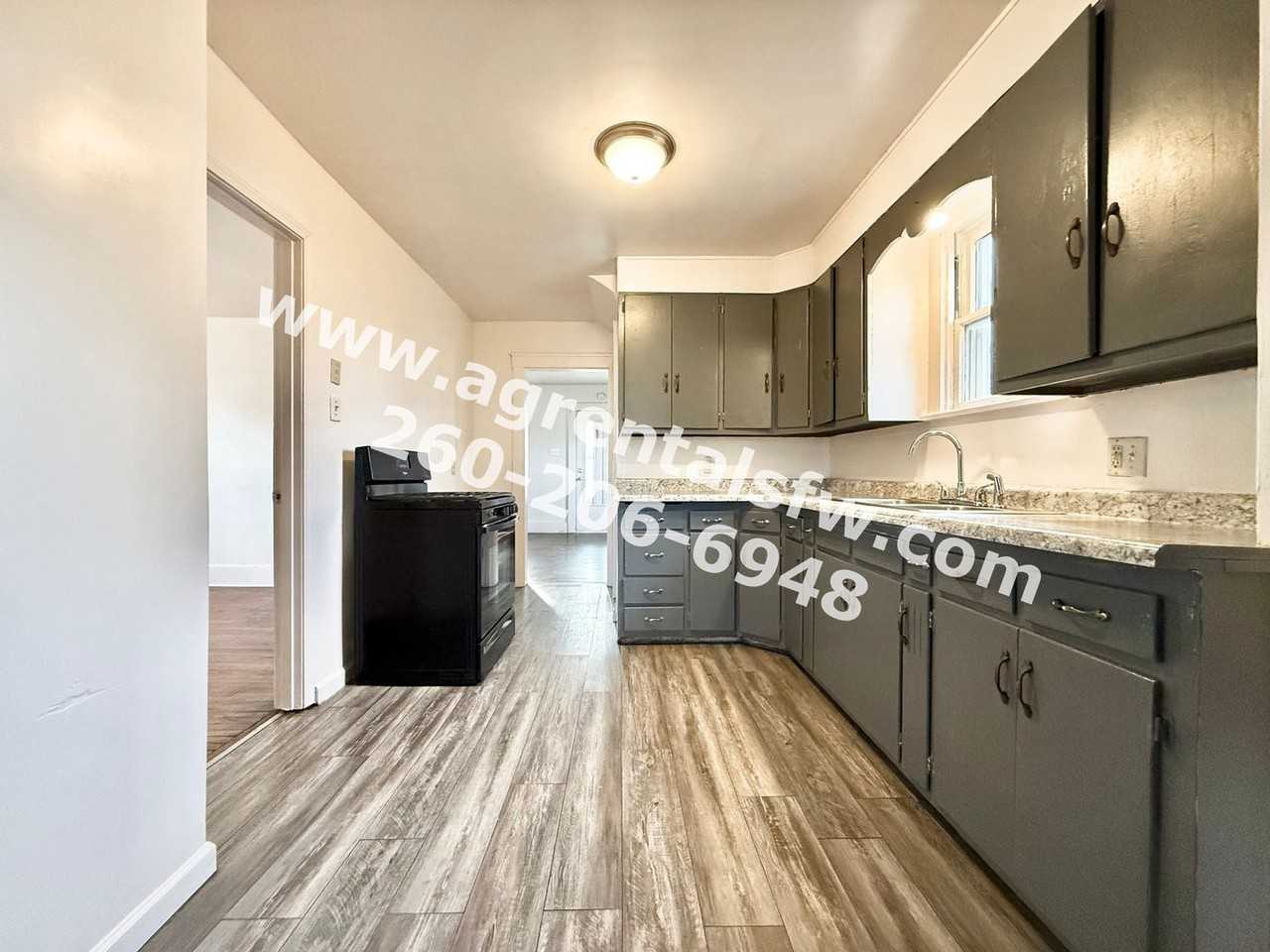 4129 S Clinton St - Photo 3 of 15