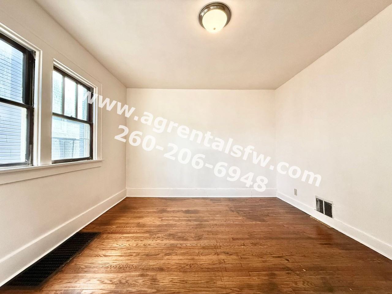 4129 S Clinton St - Photo 4 of 15