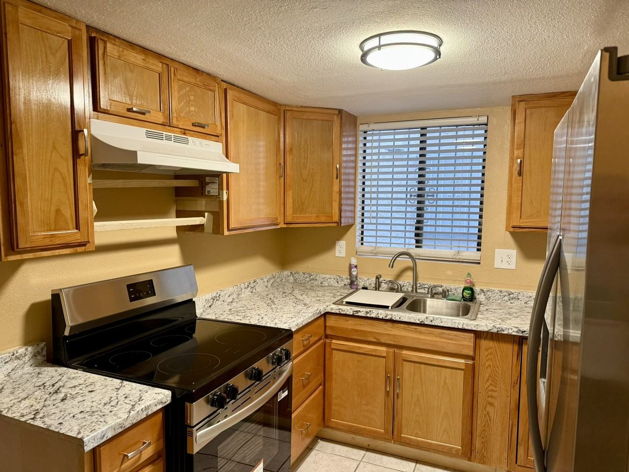 1215 N Coach Ln - Photo 2 of 14