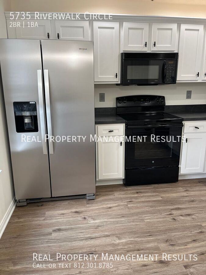 5735 Riverwalk Cir - Photo 5 of 14