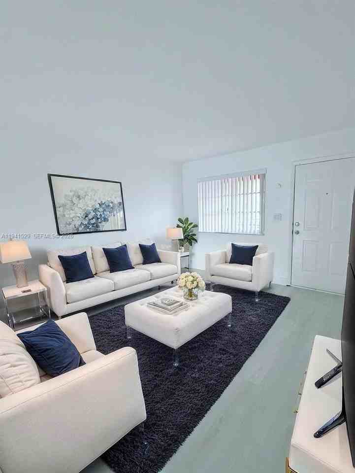 6801 W 36th Ave #102 - Photo 2 of 9