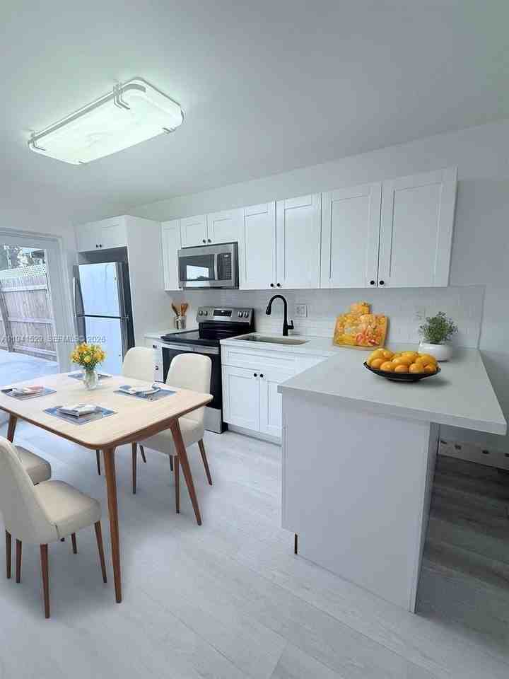 6801 W 36th Ave #102 - Photo 3 of 9