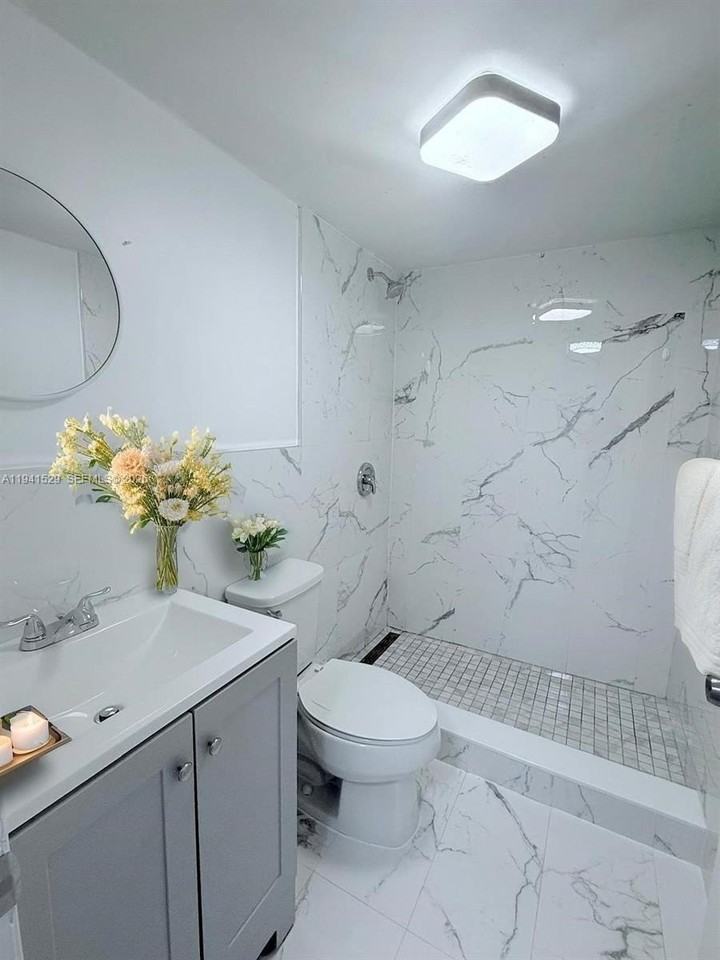 6801 W 36th Ave #102 - Photo 6 of 9