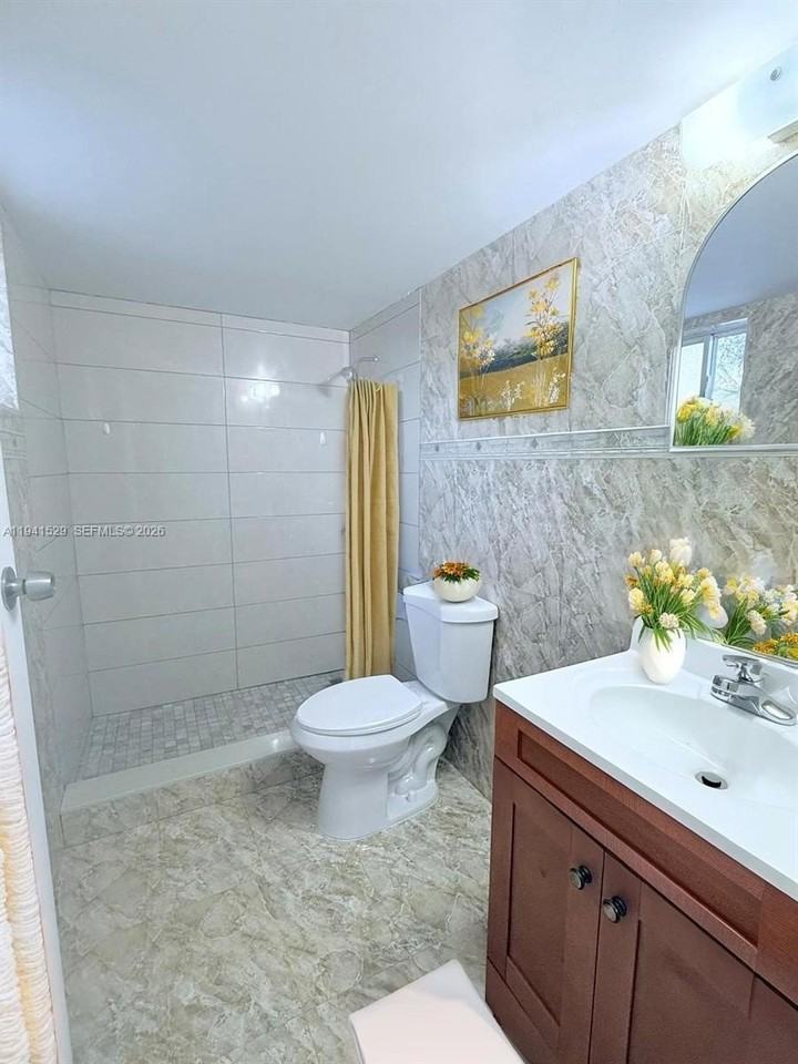 6801 W 36th Ave #102 - Photo 7 of 9