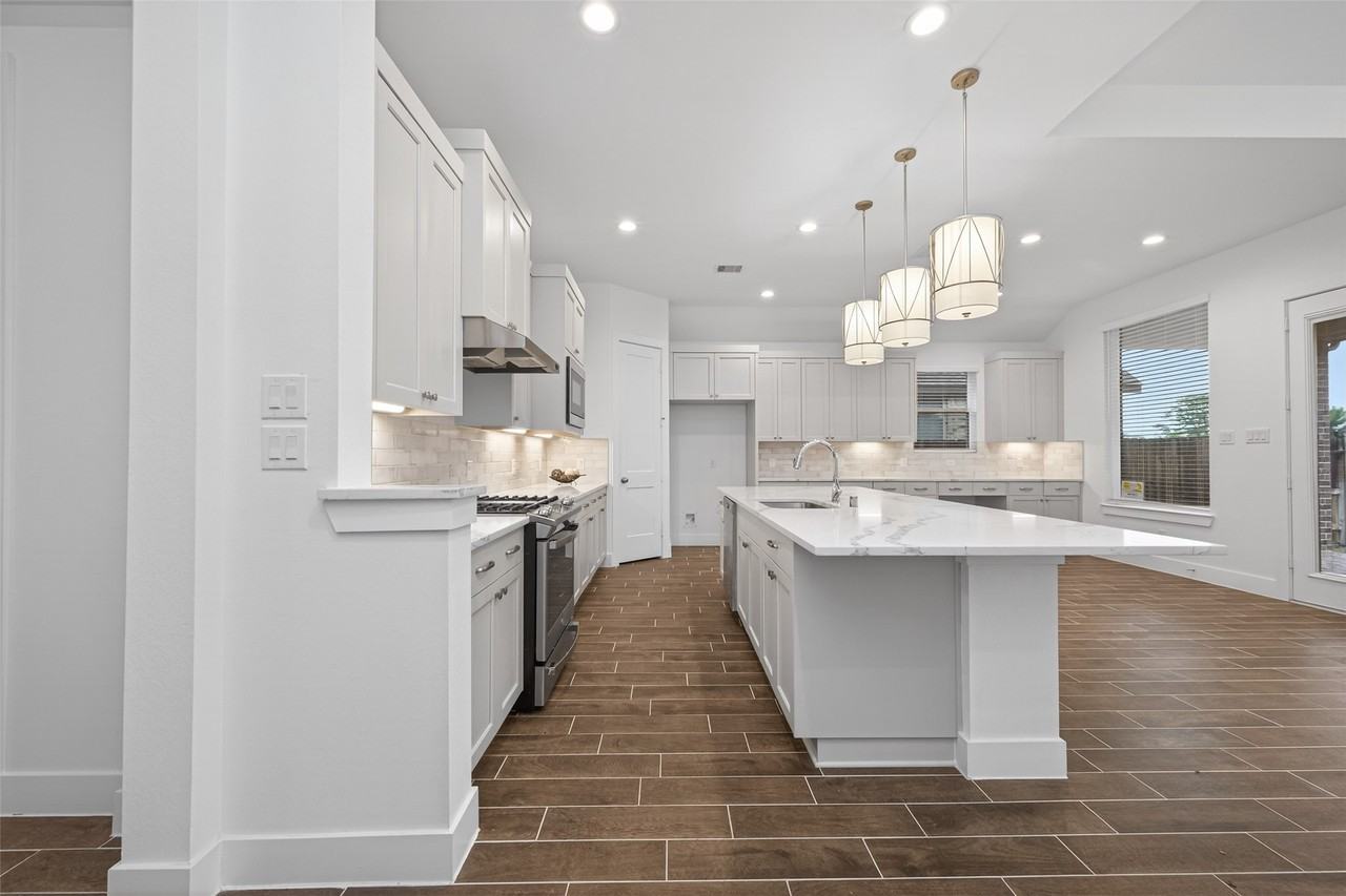 18338 Tiger Flowers Dr #18338 - Photo 3 of 50