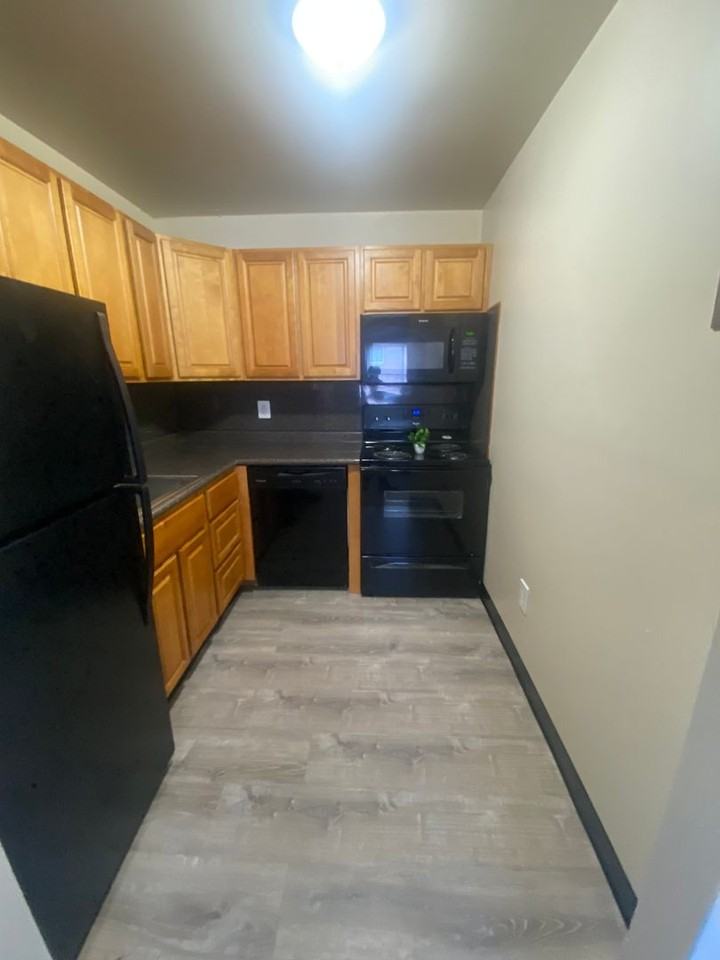 HOLLY GARDEN APARTMENTS - Photo 2 of 10