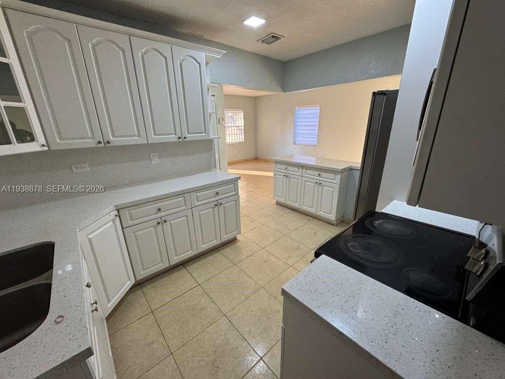 825 E 9th Ln - Photo 3 of 8