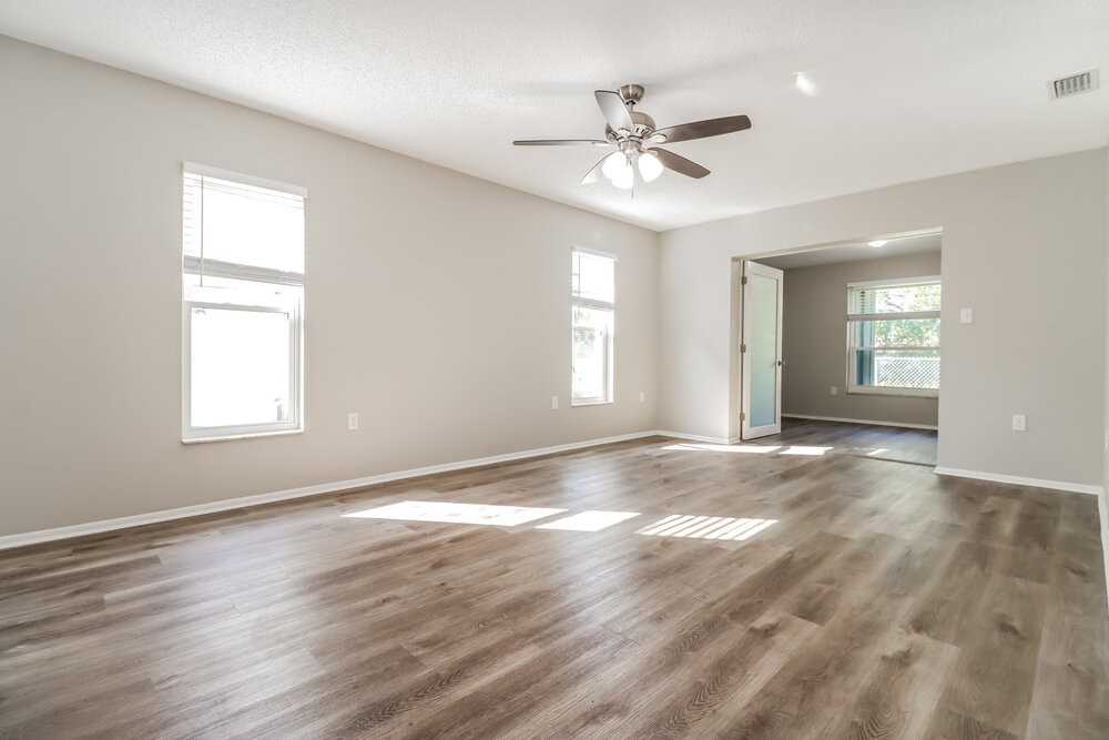 7745 Riverdale Dr - Photo 3 of 16