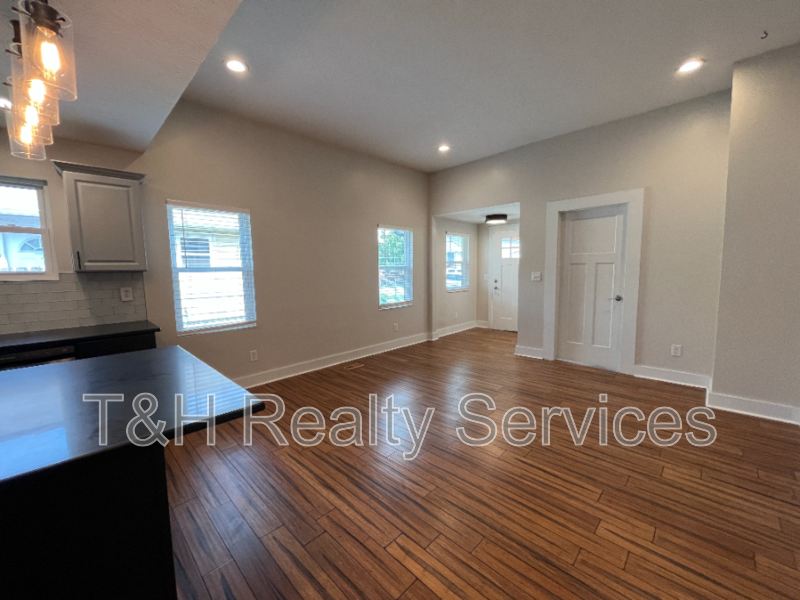 1202 Harlan St - Photo 4 of 18