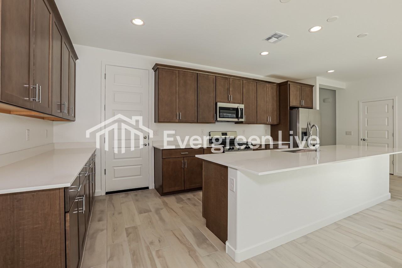 10135 E Ulysses Ave - Photo 5 of 15