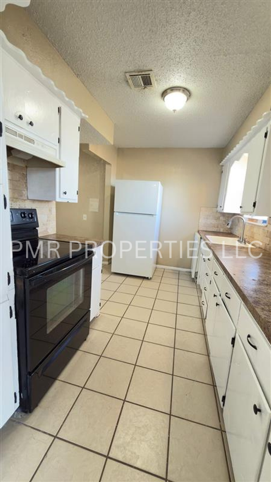 5311 Nw Cherry Ave - Photo 5 of 12